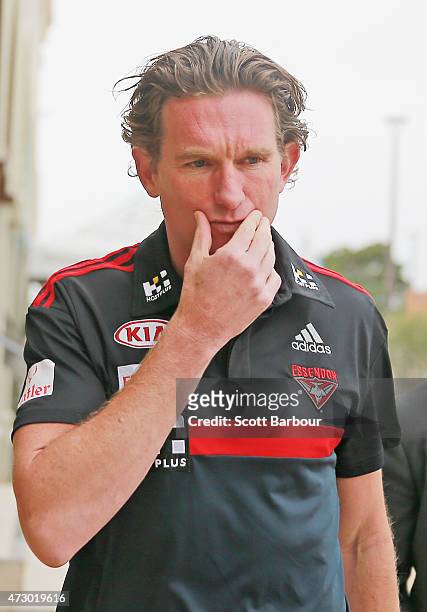 James Hird, coach of the Bombers arrives to speak to the media during an Essendon Bombers AFL recovery session at St Kilda Sea Baths on May 12, 2015...