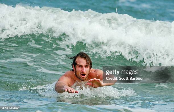 Jobe Watson, captain of the Bombers swims in the water during an Essendon Bombers AFL recovery session at St Kilda Sea Baths on May 12, 2015 in...