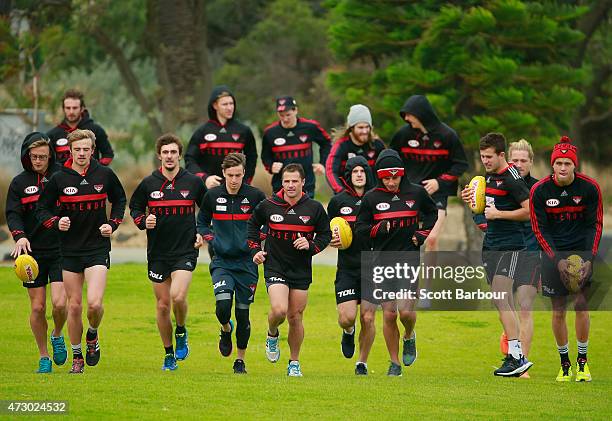 The Bombers run during an Essendon Bombers AFL recovery session at St Kilda Sea Baths on May 12, 2015 in Melbourne, Australia.