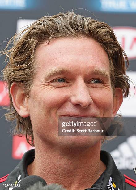 James Hird, coach of the Bombers smiles as he speaks to the media during an Essendon Bombers AFL recovery session at St Kilda Sea Baths on May 12,...