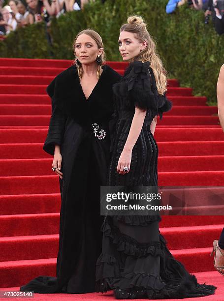 Mary-Kate Olsen and Ashley Olsen attend the "China: Through The Looking Glass" Costume Institute Benefit Gala at the Metropolitan Museum of Art on...