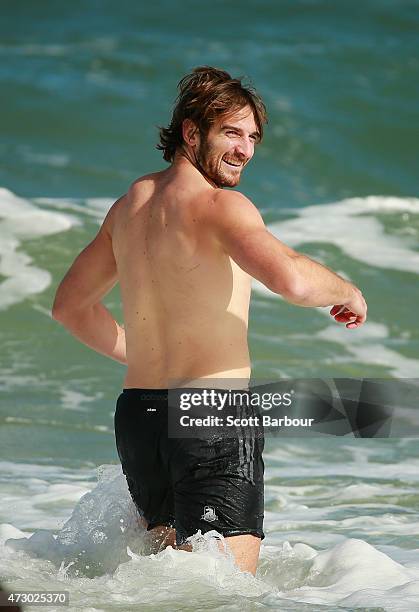 Jobe Watson, captain of the Bombers wades in the water during an Essendon Bombers AFL recovery session at St Kilda Sea Baths on May 12, 2015 in...