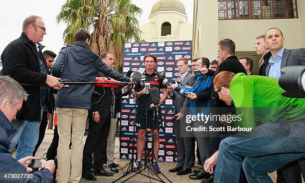 James Hird, coach of the Bombers speaks to the media during an Essendon Bombers AFL recovery session at St Kilda Sea Baths on May 12, 2015 in...