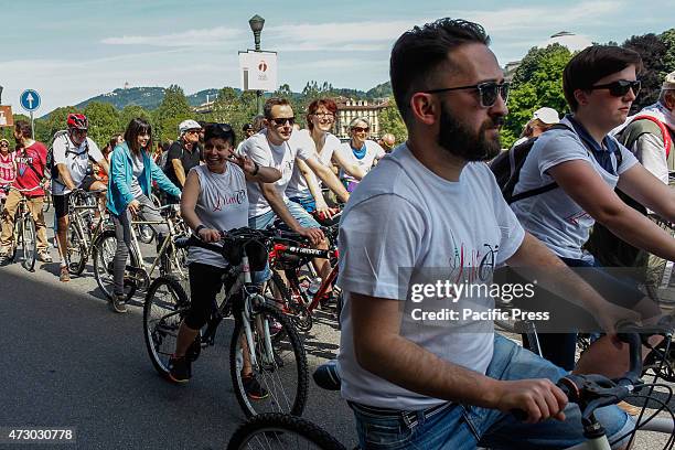 People join the cycle parade on the occasion of the 70th anniversary of the liberation of Italy from Nazi occupation and from the fascist regime, a...