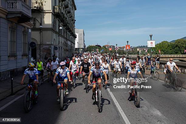 People join the cycle parade on the occasion of the 70th anniversary of the liberation of Italy from Nazi occupation and from the fascist regime, a...