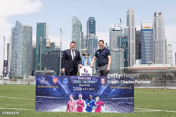 Andrew Jones , Barclays Asia co-CEO, and Richard Masters, director of sales and marketing of the Premiere League pose with the Barclays Asia Trophy...