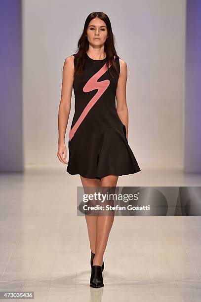 Model walks the runway in a design by Injury at the 3 Up show at Mercedes-Benz Fashion Week Australia 2015 at Carriageworks on April 16, 2015 in...