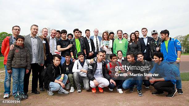 Minister Of State For Migration, Refugees And Integration Aydan Oezoguz Visits TSV Wandsetal on May 12, 2015 in Hamburg, Germany.