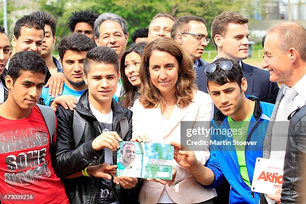 Minister Of State For Migration, Refugees And Integration Aydan Oezoguz Visits TSV Wandsetal on May 12, 2015 in Hamburg, Germany.