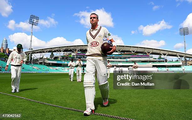 Kevin Pietersen of Surrey leaves the field at the end of the Surrey innings on 355 not out during day three of the LV County Championship match...