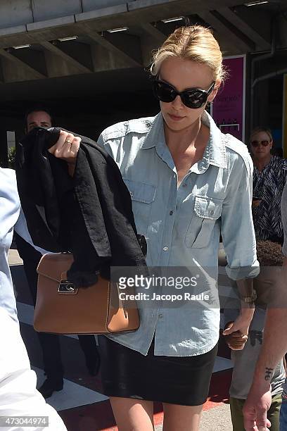 Charlize Theron and her son Jackson Theron arrive at Nice Airport during the 68th annual Cannes Film Festival on May 12, 2015 in Cannes, France.