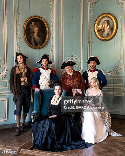 The actors Didier Barbelivien, Valentin Marceau, Mickael Miro, Slimane, Kareen Antonn and Aurore Delplace pose on the video shoot of the musical...