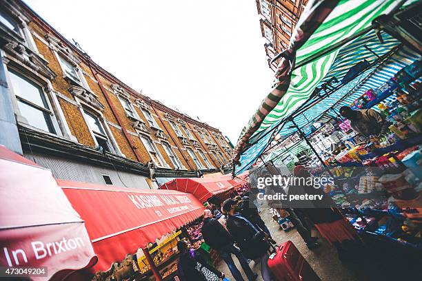 brixton street market. - brixton stock pictures, royalty-free photos & images