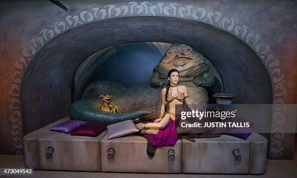 Star Wars characters Jabba The Hutt and Princess Leia are pictured at the Star Wars At Madame Tussauds attraction in London on May 12, 2015. AFP...