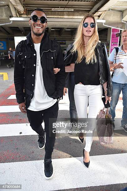 Doutzen Kroes and Sunnery James arrive at Nice Airport during the 68th annual Cannes Film Festival on May 12, 2015 in Cannes, France.