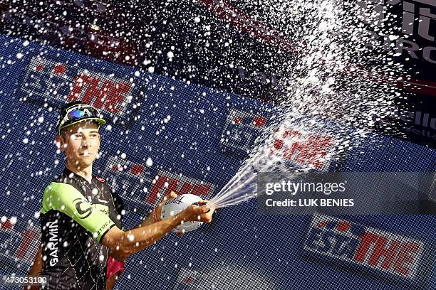 Italian Davide Formolo celebrates on the podium after winning the 4th stage of the Giro d'Italia, Tour of Italy, cycling race on May 12, 2015 in La...