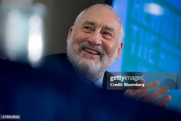 Joseph Stiglitz, Nobel prize-winning economist and professor of economics at Columbia University,, smiles while speaking during a panel session at a...