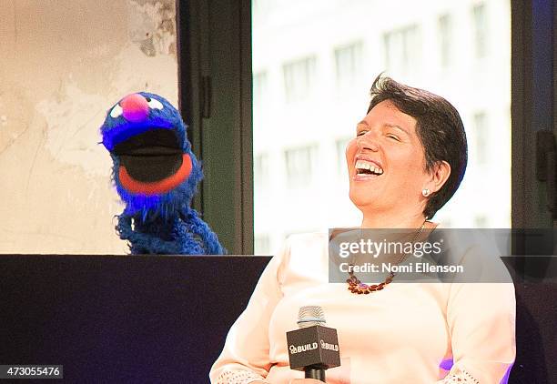 Grover and Dr. Jeanette Betancourt attend AOL Build Speaker Series: Sesame Street's Grover And The USO - Dr. Jeanette Betancourt And Rachel...