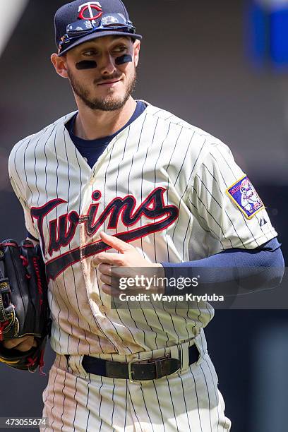 Jordan Schafer of the Minnesota Twins heads to the dugout in a game against the Chicago White Sox on May 2, 2015 at Target Field in Minneapolis,...