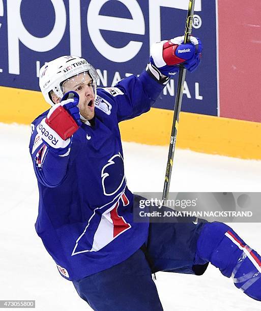 Forward Stephane da Costa of France celebrates after scoring the last penalty shootout past goalkeeper Edgars Masalskis of Latvia to win the group A...