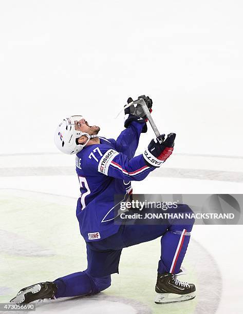 Forward Yorick Treille of France celebrates after scoring a goal during the group A preliminary round match Latvia vs France at the 2015 IIHF Ice...