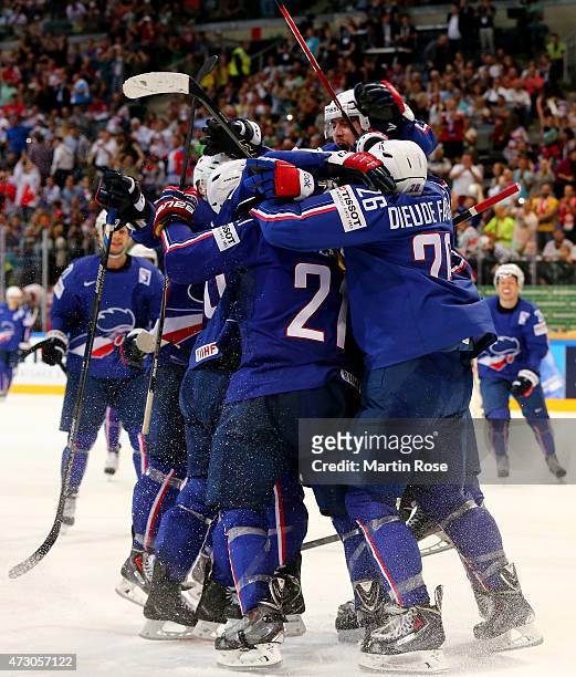 Laurent Meunier of France celebrate victory over Latvia with his team mates the IIHF World Championship group A match between Latvia and France at o2...