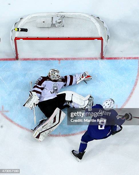 Edgars Masalskis, goaltender of Latvia tends net against France during the IIHF World Championship group A match between Latvia and France at o2...