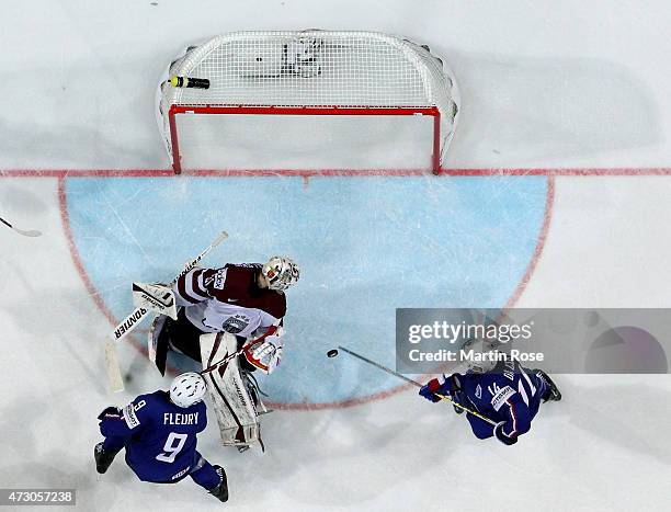 Edgars Masalskis, goaltender of Latvia tends net against France during the IIHF World Championship group A match between Latvia and France at o2...