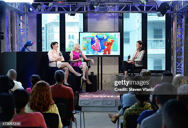 Grover of Sesame Street, Dr. Jeanette Betancourt and Rachel Tischler of the USO attend AOL Build Speaker Series: "Sesame Street's Grover And The USO...