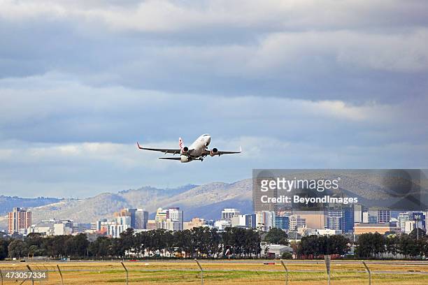 virgin plane taking-off from adelaide airport - adelaide stock pictures, royalty-free photos & images