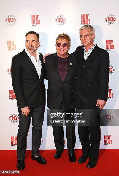 David Furnish, Sir Elton John and Stephen Daldry arrive for the 10 Year Anniversary performance of Billy Elliot at Victoria Palace Theatre on May 12,...