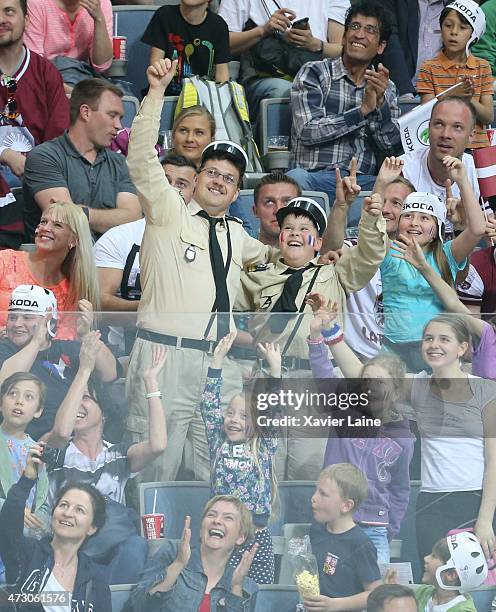 French fans celebrate the victory during the 2015 IIHF World Championship between Latvia and France at O2 arena ,on May 12,2015 in Prague, Czech...