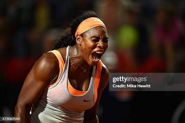 Serena Williams of USA screams after winning a point against Anastasia Pavlyuchenkova of Russia in their Second Round match on Day Three of The...