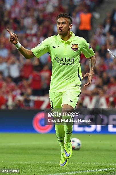 Neymar of Barcelona celebrates as he scores their first goal during the UEFA Champions League semi final second leg match between FC Bayern Muenchen...