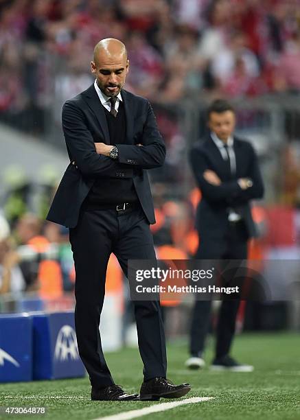 Josep Guardiola head coach of Bayern Muenchen looks dejected during the UEFA Champions League semi final second leg match between FC Bayern Muenchen...