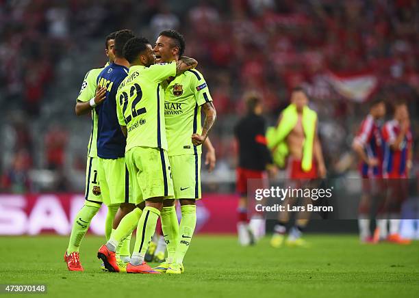 Neymar of Barcelona celebrates reaching the Champions League final with Daniel Alves of Barcelona after the UEFA Champions League semi final second...