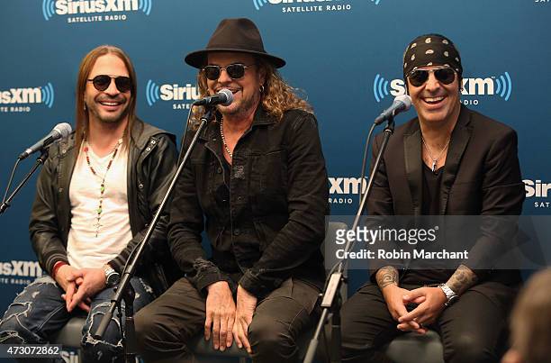 Sergio Vallin, Fher Olvera and Alex Gonzalez of Latin Rock Band Mana visit for "SiriusXM's Town Hall" at SiriusXM Studios on May 12, 2015 in New York...