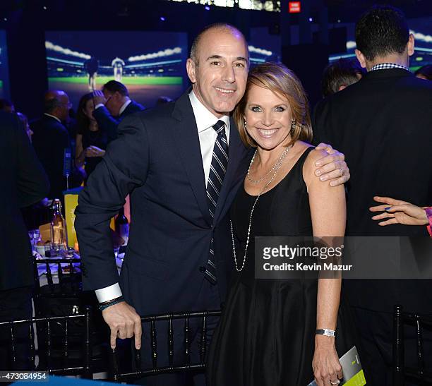 Matt Lauer and Katie Couric attend The Robin Hood Foundation's 2015 Benefit at Jacob Javitz Center on May 12, 2015 in New York City.