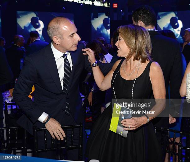 Matt Lauer and Katie Couric attend The Robin Hood Foundation's 2015 Benefit at Jacob Javitz Center on May 12, 2015 in New York City.