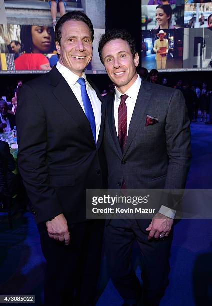 New York Governor Andrew Cuomo and Chris Cuomo attend The Robin Hood Foundation's 2015 Benefit at Jacob Javitz Center on May 12, 2015 in New York...