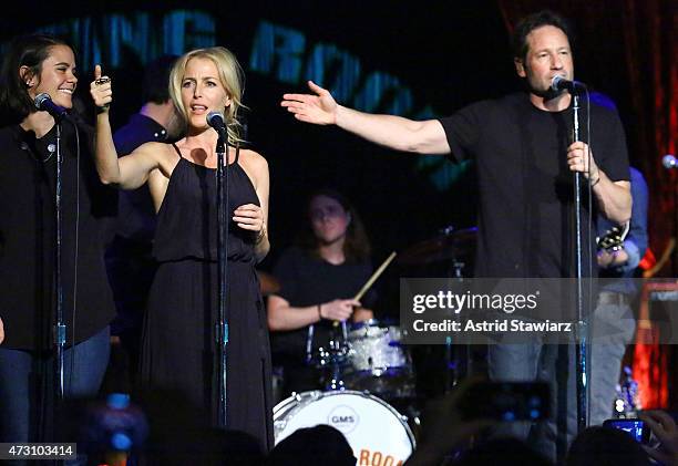 Actors Gillian Anderson and David Duchovny attend David Duchovny in concert at The Cutting Room on May 12, 2015 in New York City.