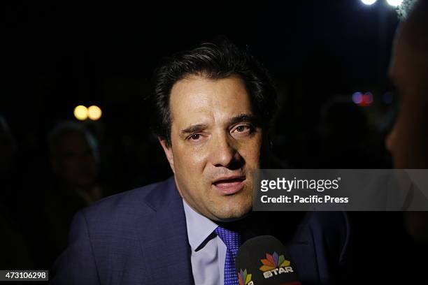 Adonis Georgiadis, parliamentary spokesman of Néa Dimokratía and former Minister of Health, gives an interview at Syntagma Square. People gathered...