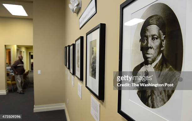 Portraits of Harriet Tubman hang in the Harriet Tubman Museum and Education Center in Cambridge, MD on March 5, 2013. There are plans for a national...