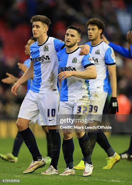 Craig Conway of Blackburn and teammate Tom Cairney celebrate their draw following the FA Cup Quarter Final match between Liverpool and Blackburn...