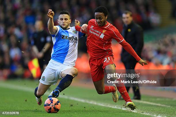 Craig Conway of Blackburn battles with Raheem Sterling of Liverpool during the FA Cup Quarter Final match between Liverpool and Blackburn Rovers at...