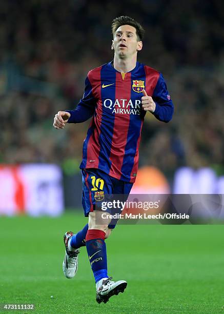 Lionel Messi of Barcelona in action during the UEFA Champions League Round of 16 match between FC Barcelona and Manchester City at Camp Nou on March...