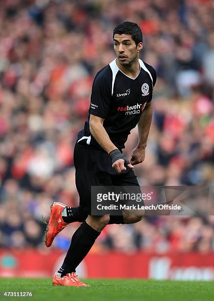 Luis Suarez in action during the Liverpool All-Star Charity match at Anfield on March 29, 2015 in Liverpool, England.