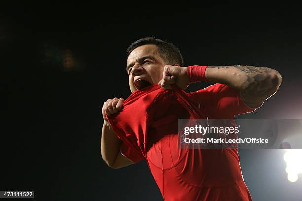 Philippe Coutinho of Liverpool celebrates after scoring their 1st goal during the FA Cup Quarter Final Replay match between Blackburn Rovers and...