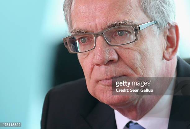 German Interior Minister Thomas de Maiziere arrives for the weekly government cabinet meeting on May 13, 2015 in Berlin, Germany. High on the...