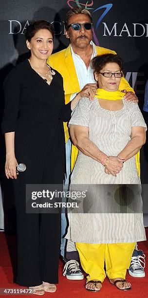 Indian Bollywood actors Madhuri Dixit Nene , Jackie Shroff and choreographer Saroj Khan pose for a photograph during a promotional event for the...